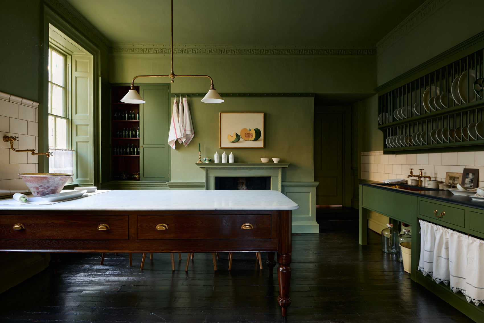 A Wilkes green Heirloom kitchen with a marble worktop