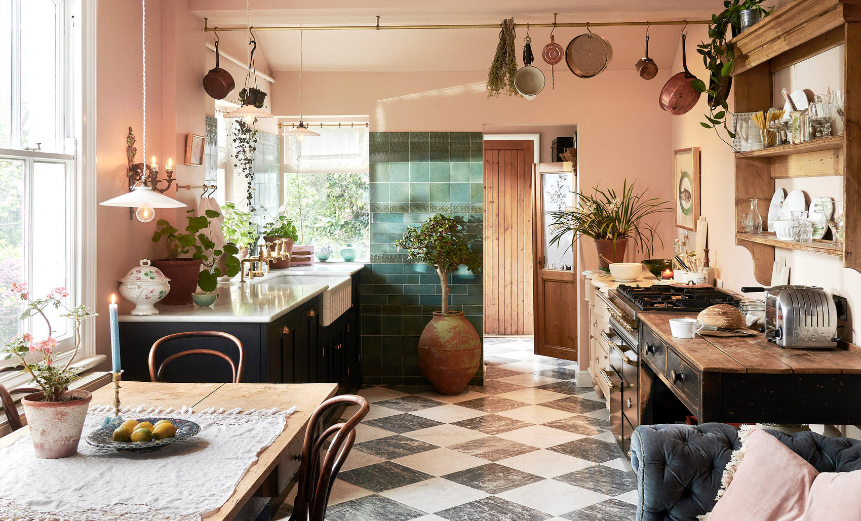 A bright peach-coloured room with a chequerboard marble floor